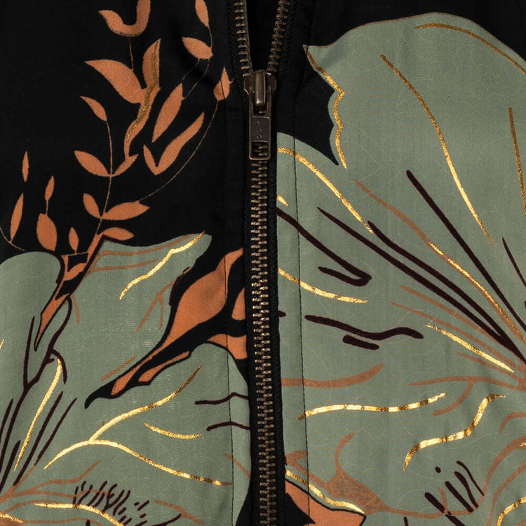 Arena Formentera chaqueta bomber bohemia en New Saari con estampado botánico verde y negro para mujer y teen