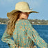Arena Formentera vestido camisero bohemio en New Saari con estampado floral verde y naranja para mujer