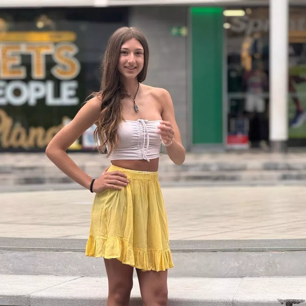 Falda amarillo, Sun