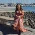 Arena Formentera vestido largo cruzado bohemio en rayón ligero con estampado floral en tonos cálidos para mujer